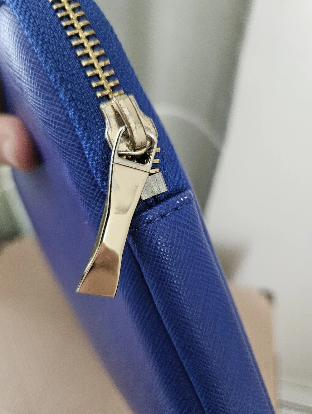 kate spade cobalt blue laptop sleeve with gold logo plaque